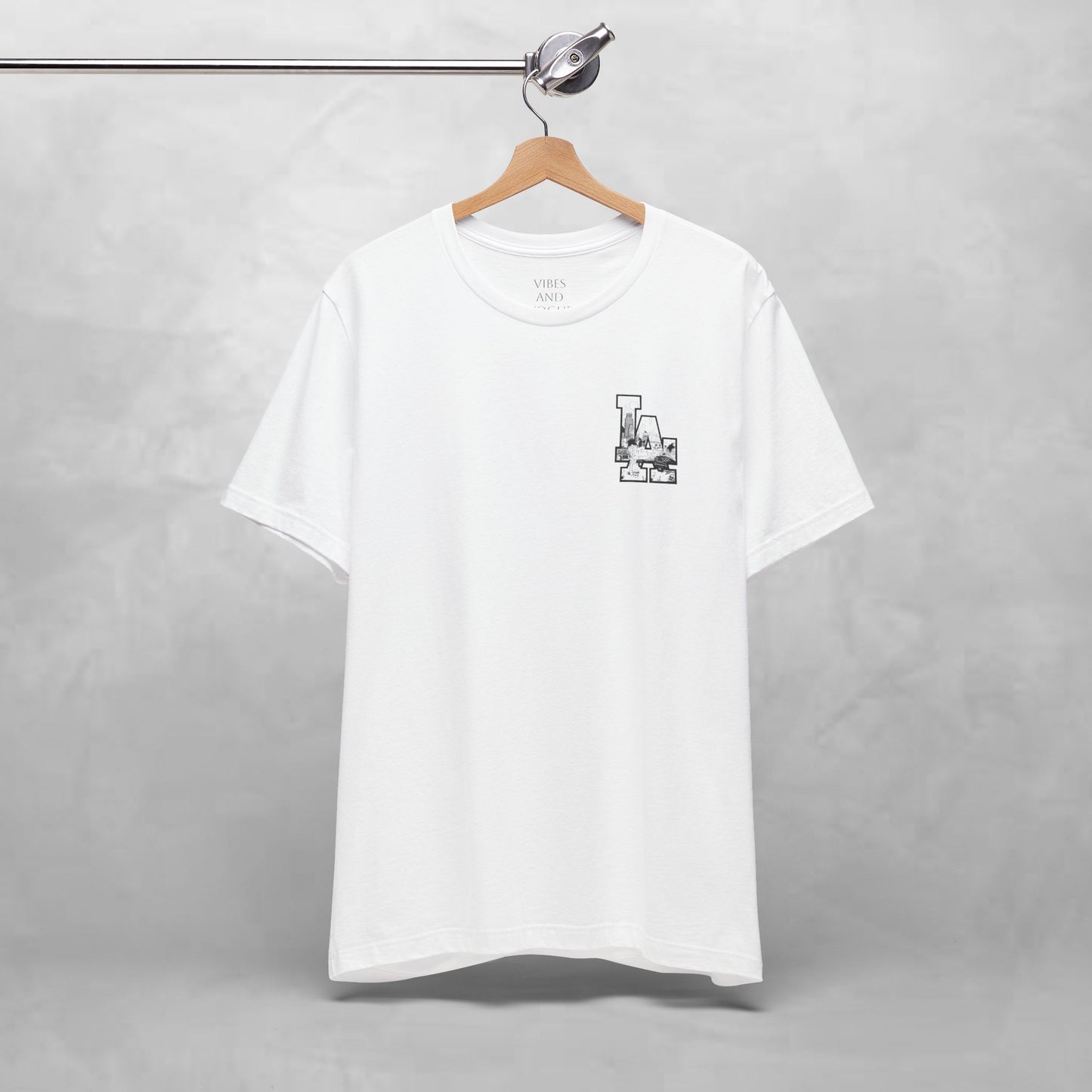 Minimalist Cityscape Pocket Tee — Small Black Line Art Chest Print