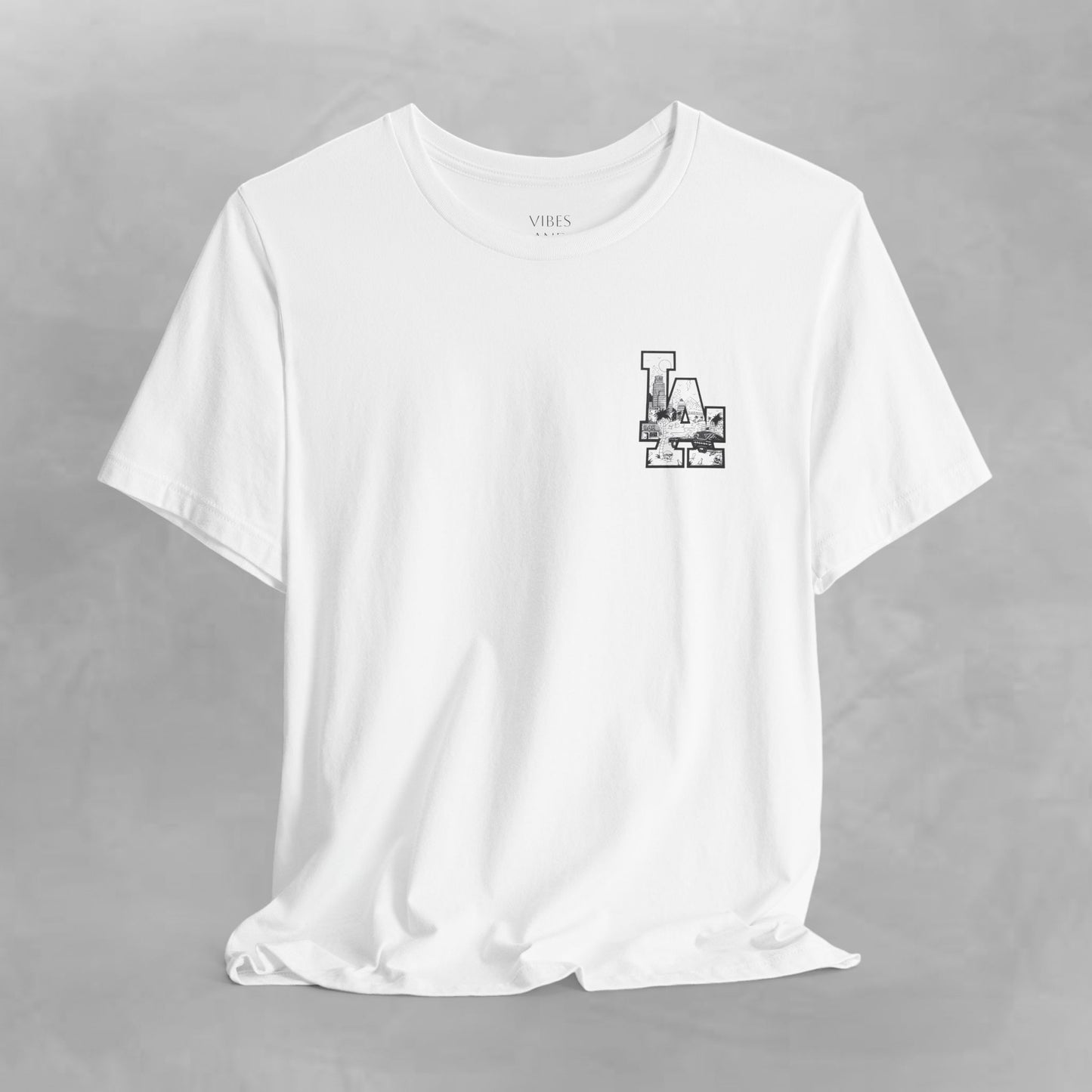 Minimalist Cityscape Pocket Tee — Small Black Line Art Chest Print