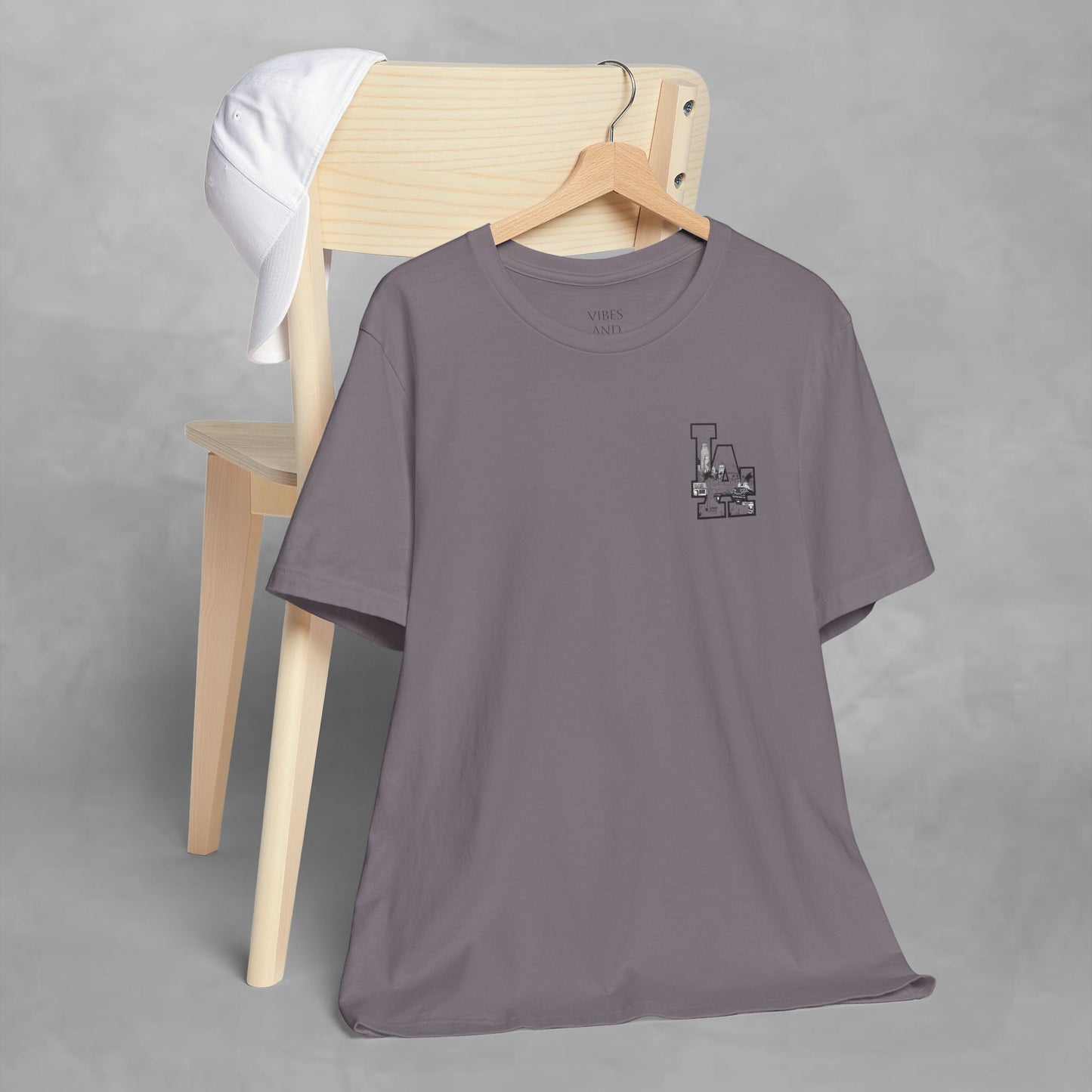 Minimalist Cityscape Pocket Tee — Small Black Line Art Chest Print