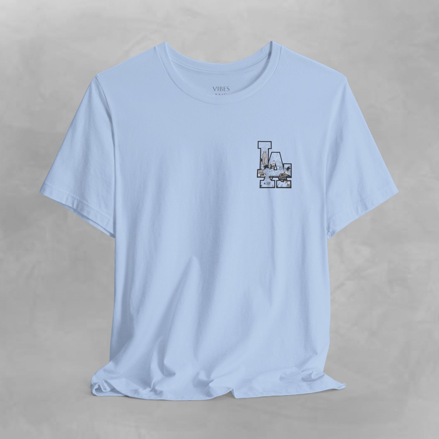 Minimalist Cityscape Pocket Tee — Small Black Line Art Chest Print