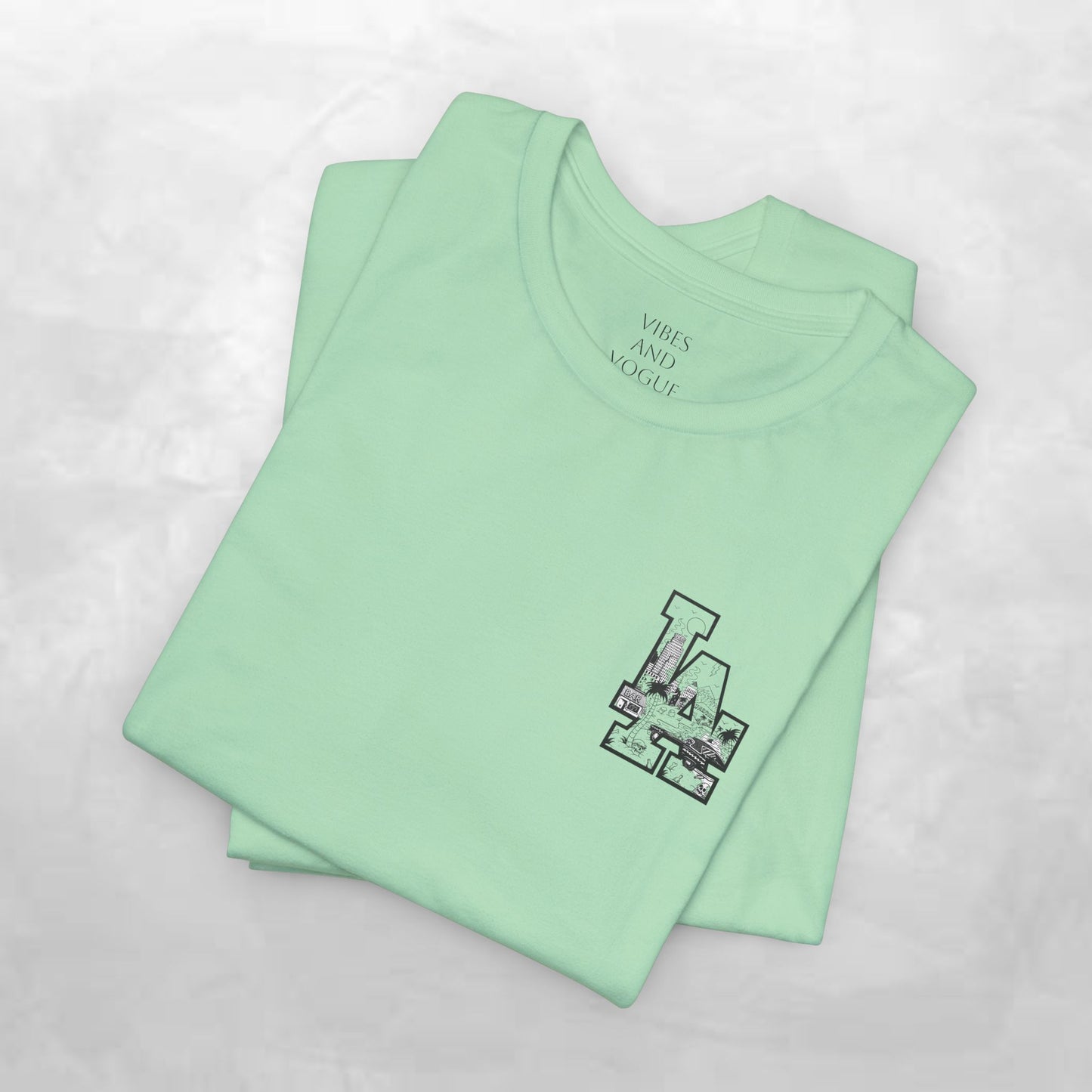 Minimalist Cityscape Pocket Tee — Small Black Line Art Chest Print