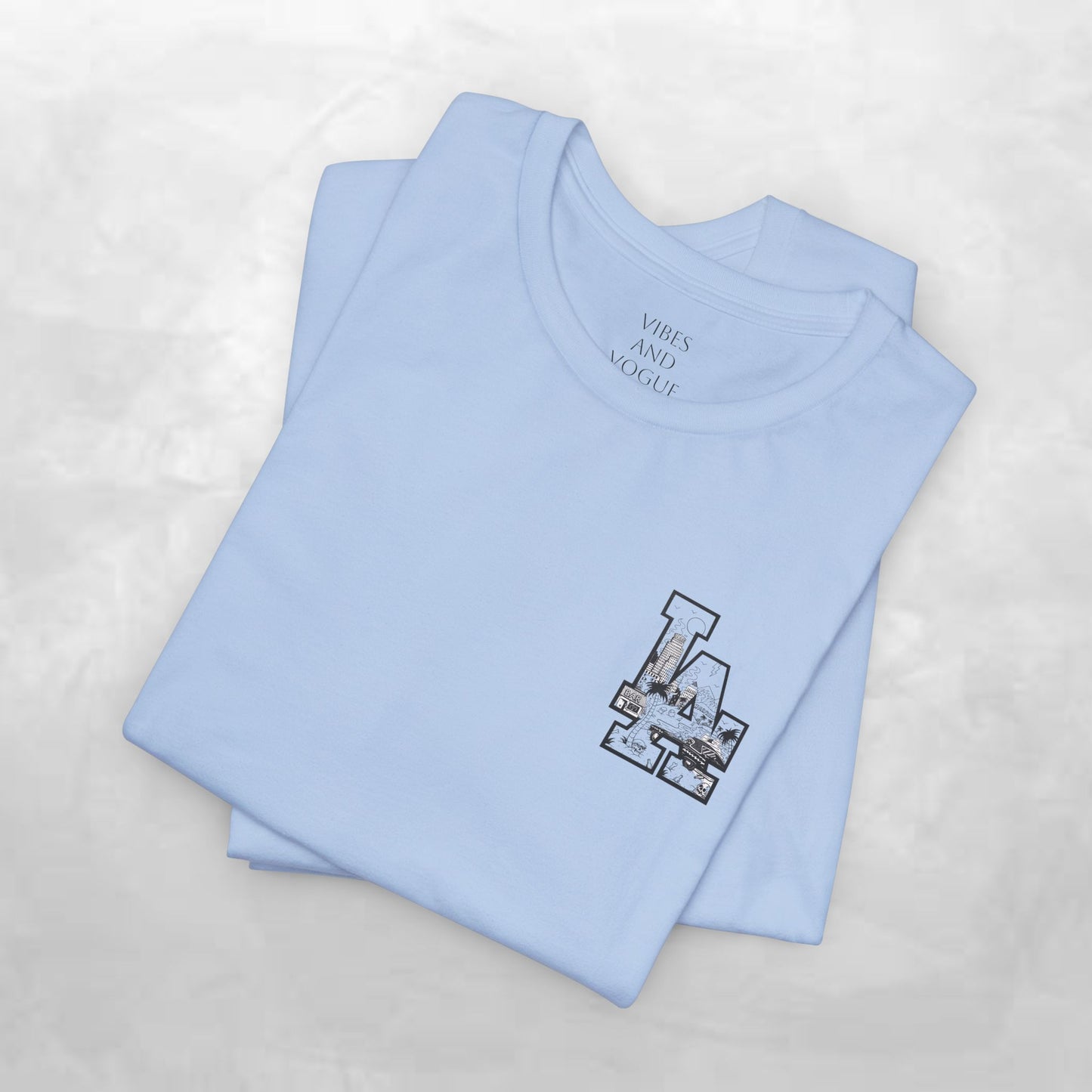 Minimalist Cityscape Pocket Tee — Small Black Line Art Chest Print