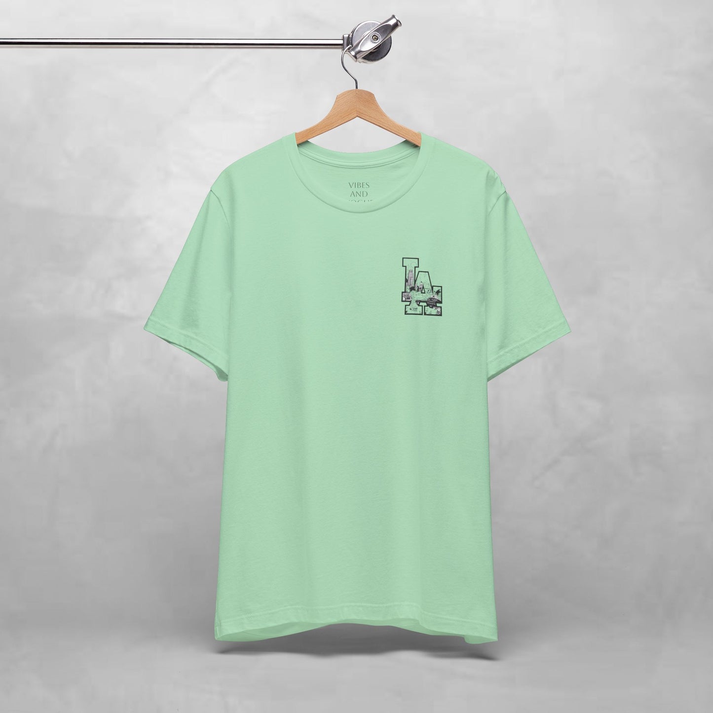 Minimalist Cityscape Pocket Tee — Small Black Line Art Chest Print