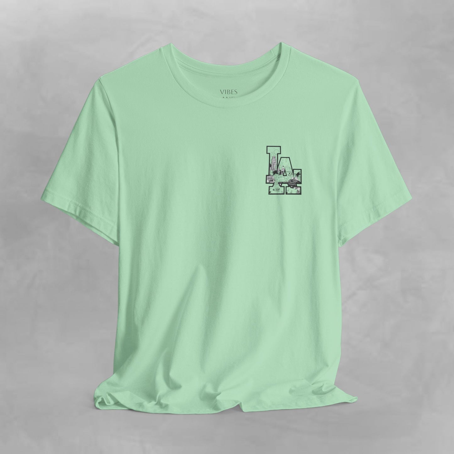 Minimalist Cityscape Pocket Tee — Small Black Line Art Chest Print