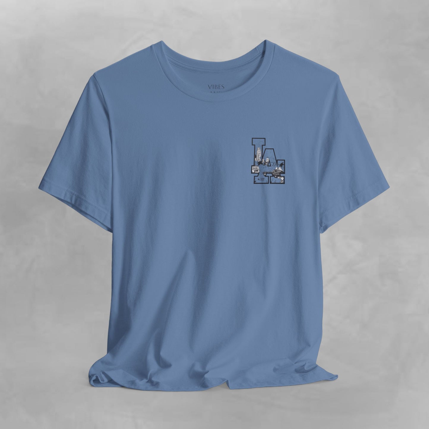 Minimalist Cityscape Pocket Tee — Small Black Line Art Chest Print