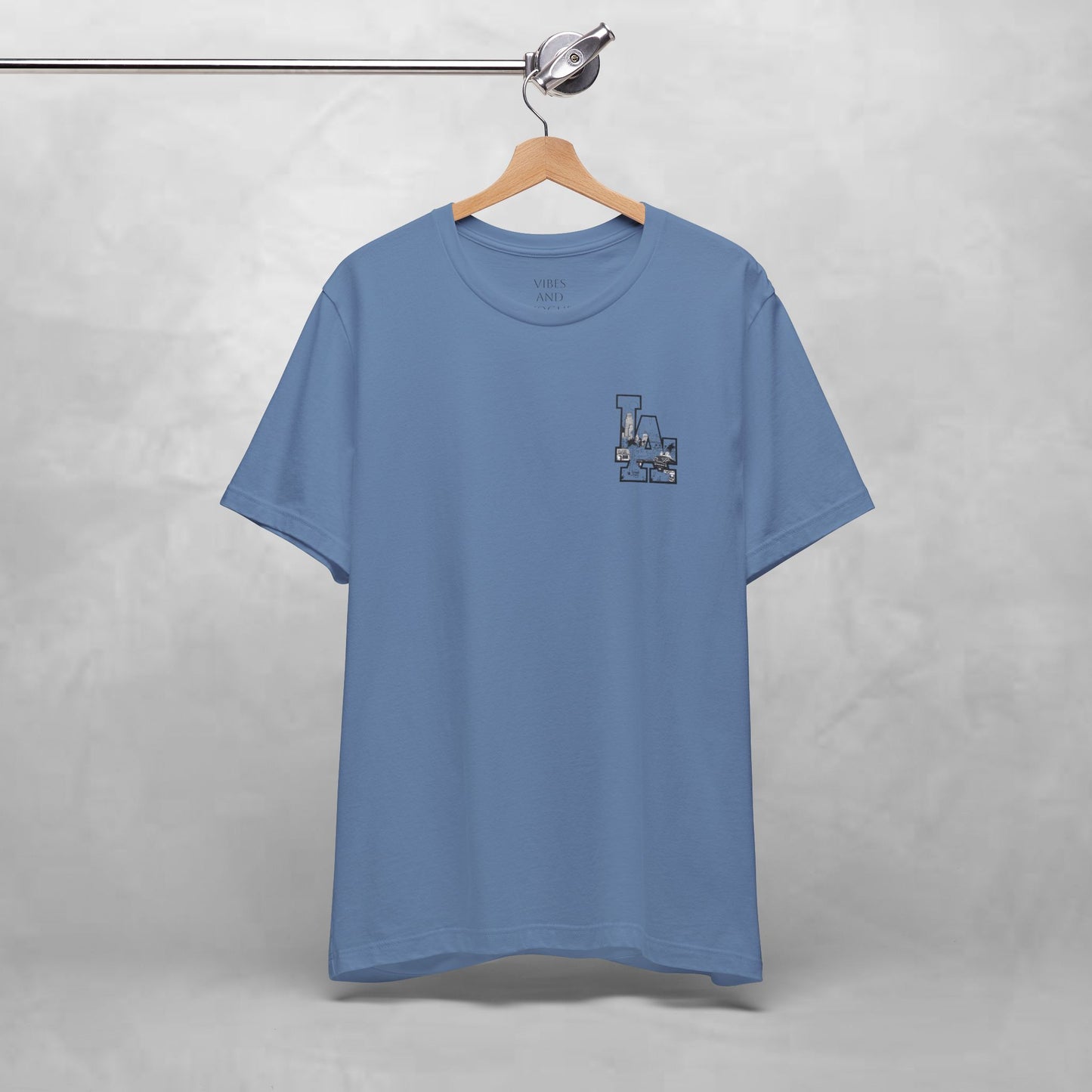 Minimalist Cityscape Pocket Tee — Small Black Line Art Chest Print