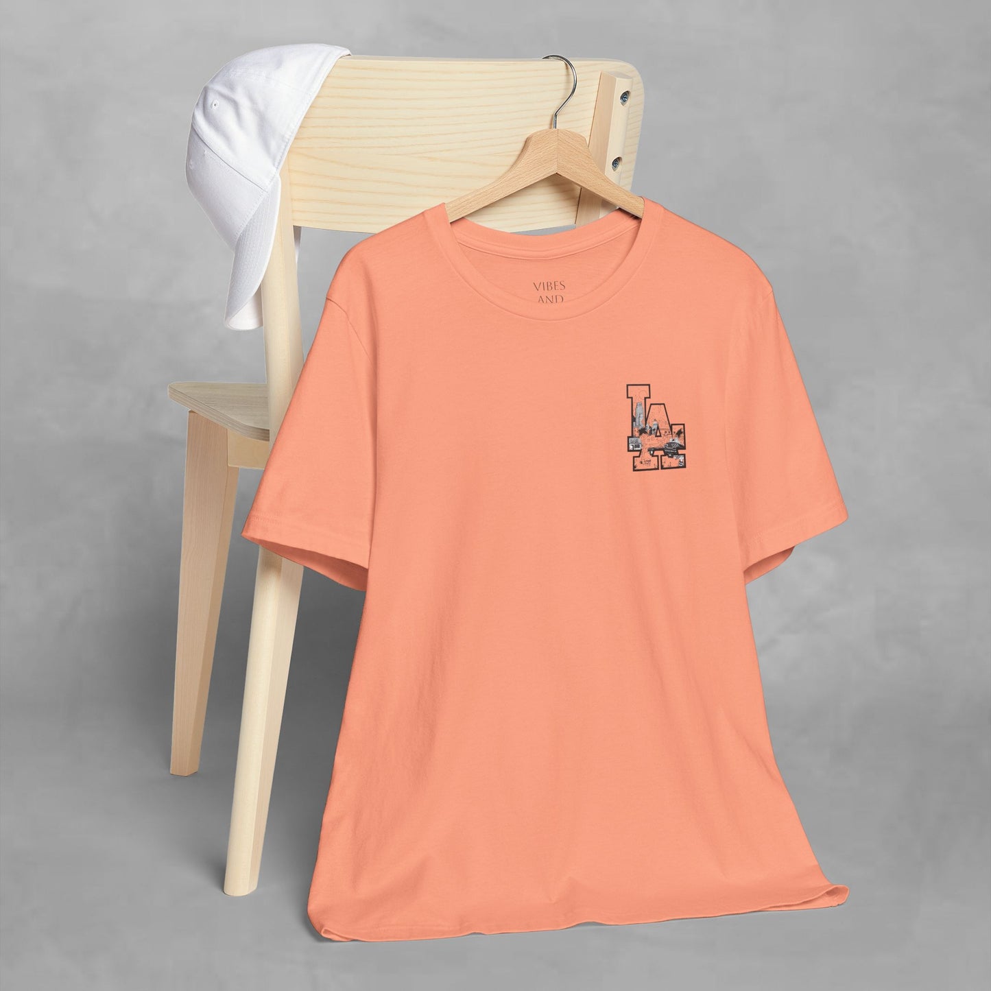 Minimalist Cityscape Pocket Tee — Small Black Line Art Chest Print