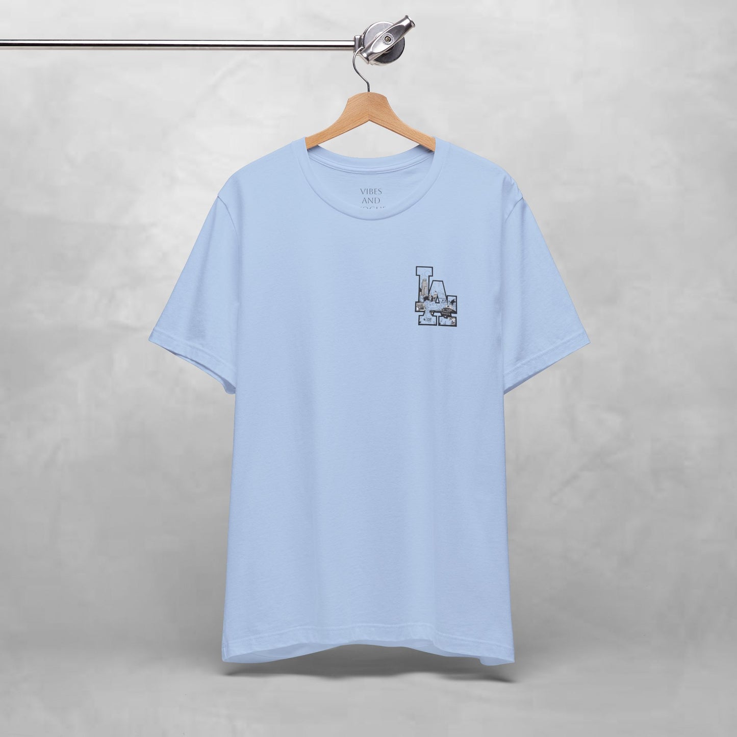Minimalist Cityscape Pocket Tee — Small Black Line Art Chest Print