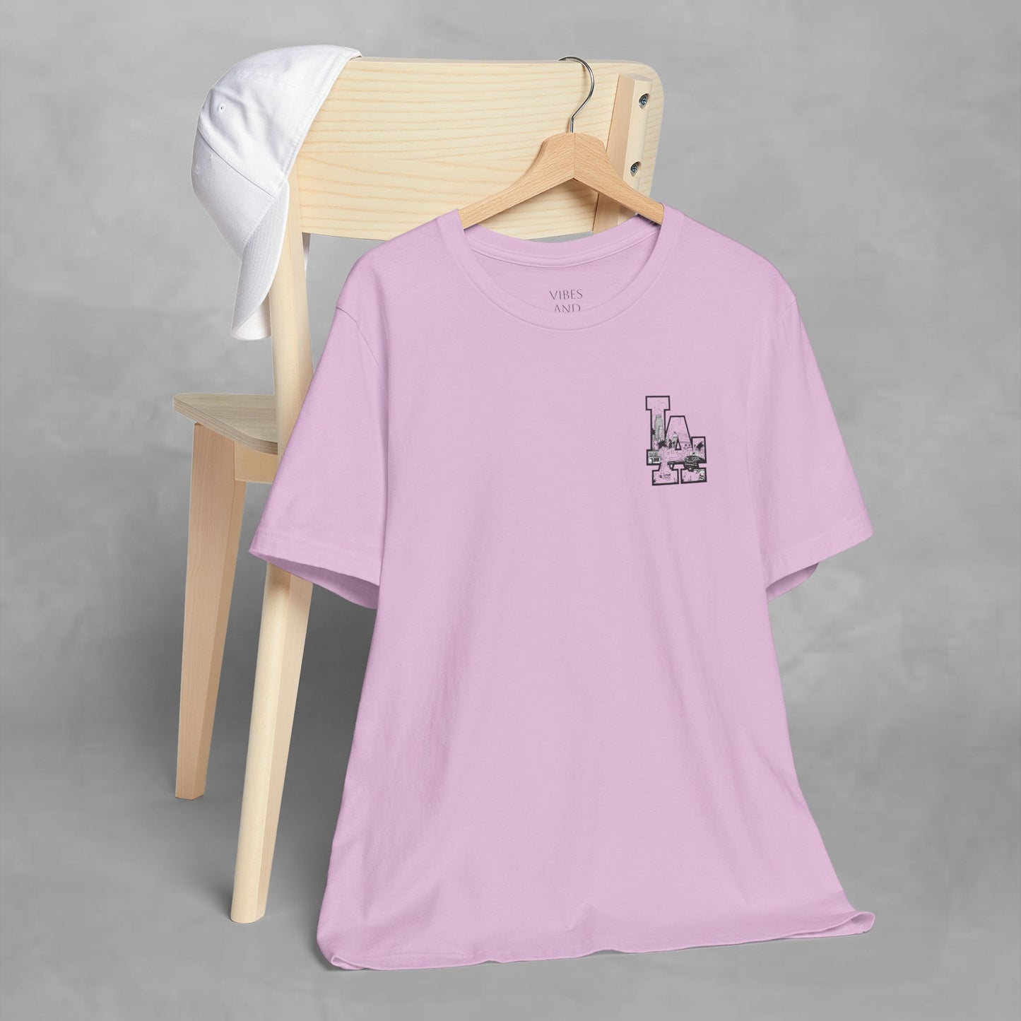 Minimalist Cityscape Pocket Tee — Small Black Line Art Chest Print
